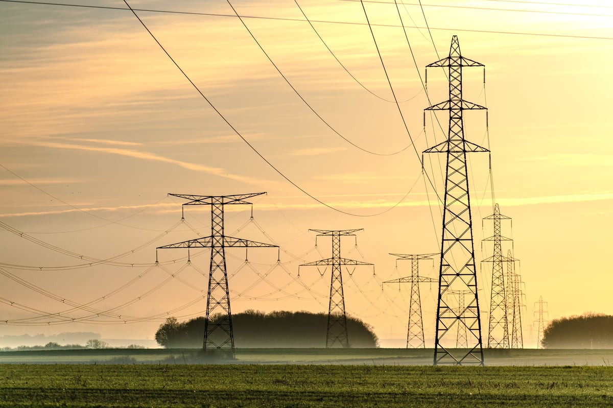 Electricity pylon at sunrise