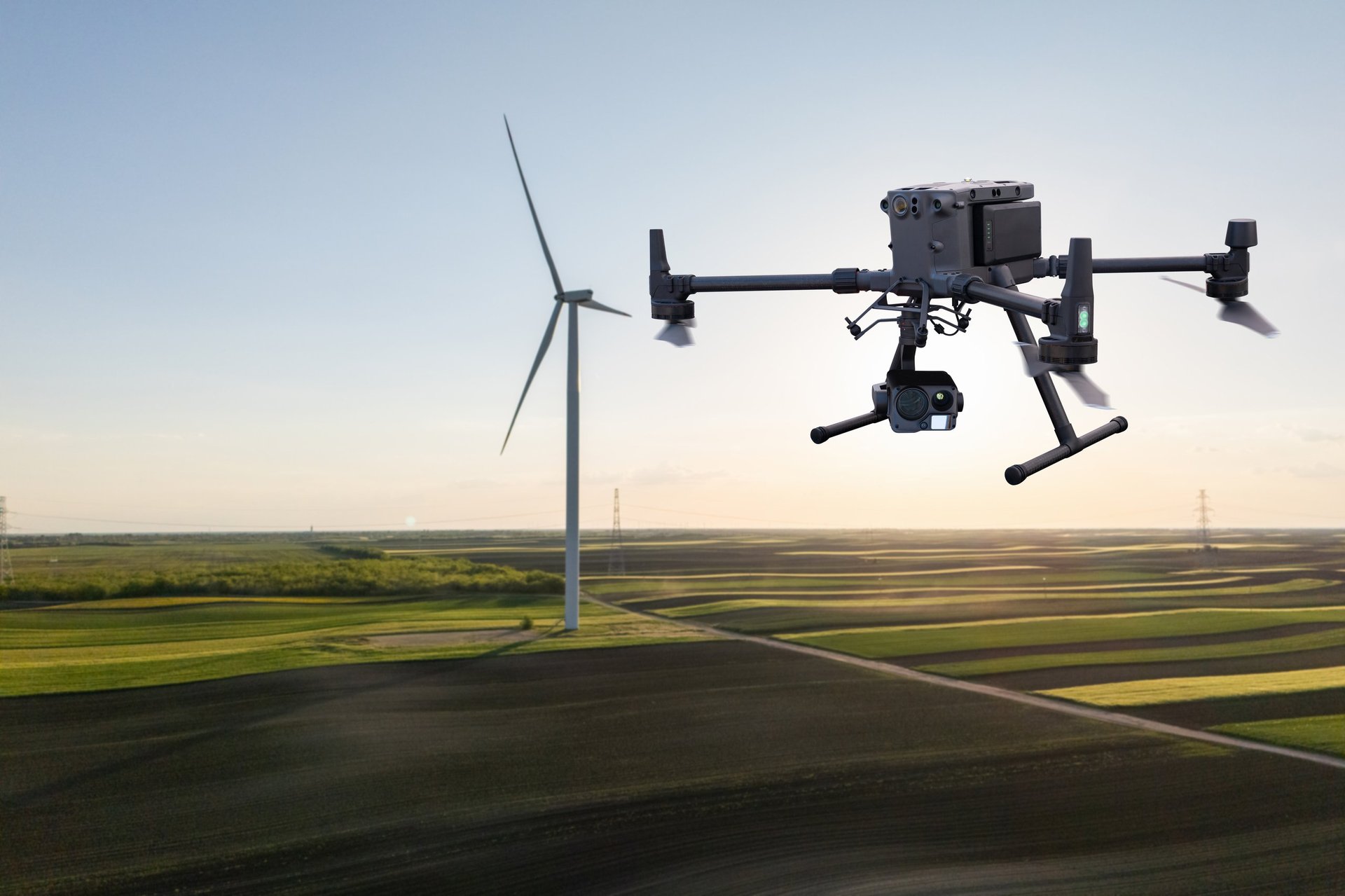 Industrial drone inspecting wind turbines